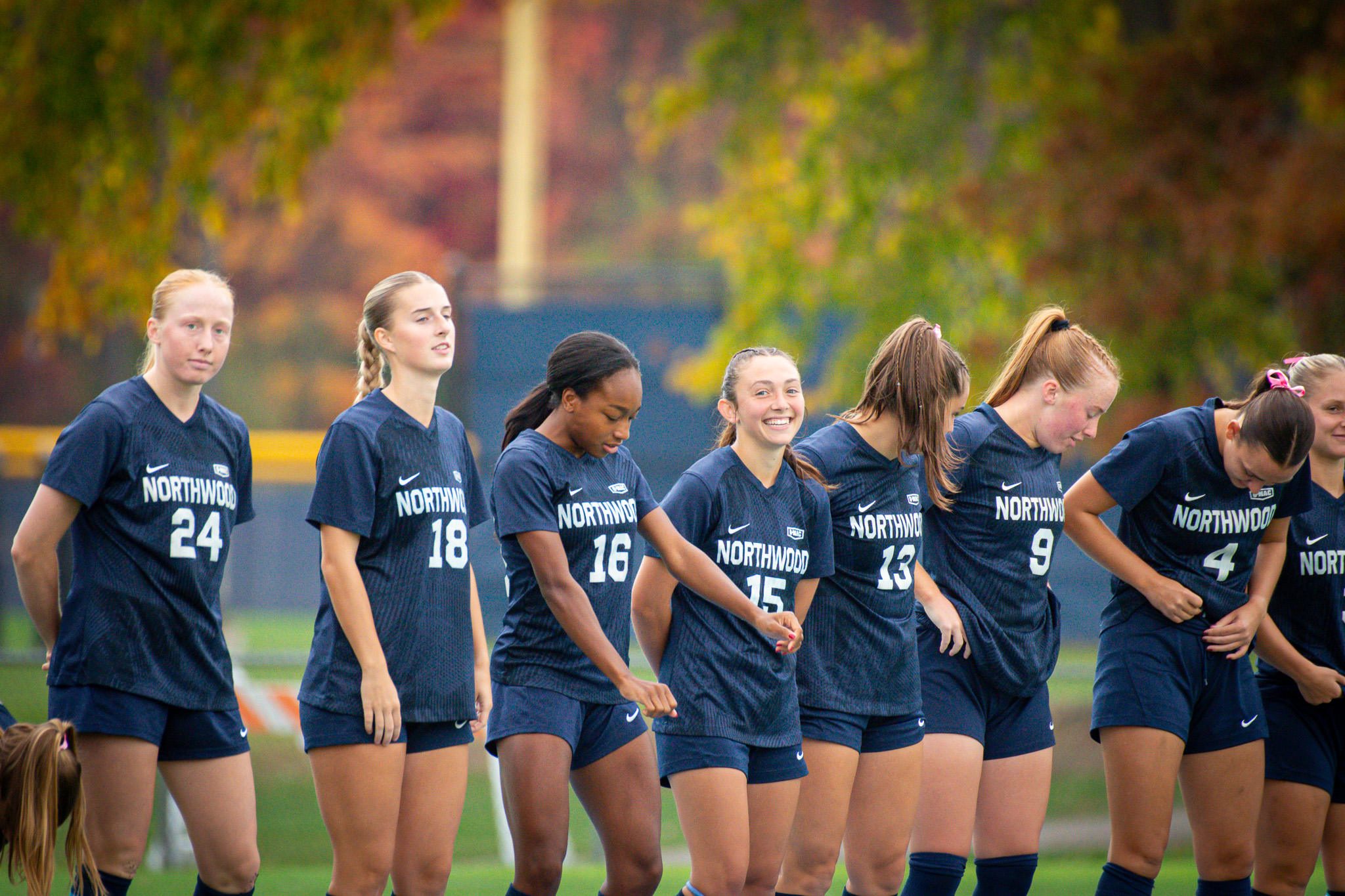Mari Jackson standing with Northwood teammates